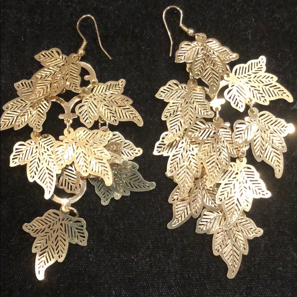 Gold metal leaf pattern earrings.